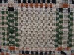 Coverlet, Geometric, Overshot, Green, Brown, Black & Natural, Linen, Wool, 2 Panel, Fringe: Applied, Fringe: 3 Sides, 3 Color Tape Woven Fringe, Border: 2 Sides, No Mark.