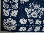 Coverlet, Figured & Fancy, Blue & Natural, Double Weave, Cotton, Wool, 1 piece, Fringe: None, Border: 4 Sides, Border: Grapevine, Corner Block: 8 Point Star, Mark in Side Borders:  "HILA BAYLES 1835", Long Island.