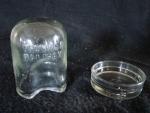 Chicken Waterer, glass, two-piece, open bottom,  Mark: 'Thomas's Halifax [on face of top], Made in England [on bottom of base]'.